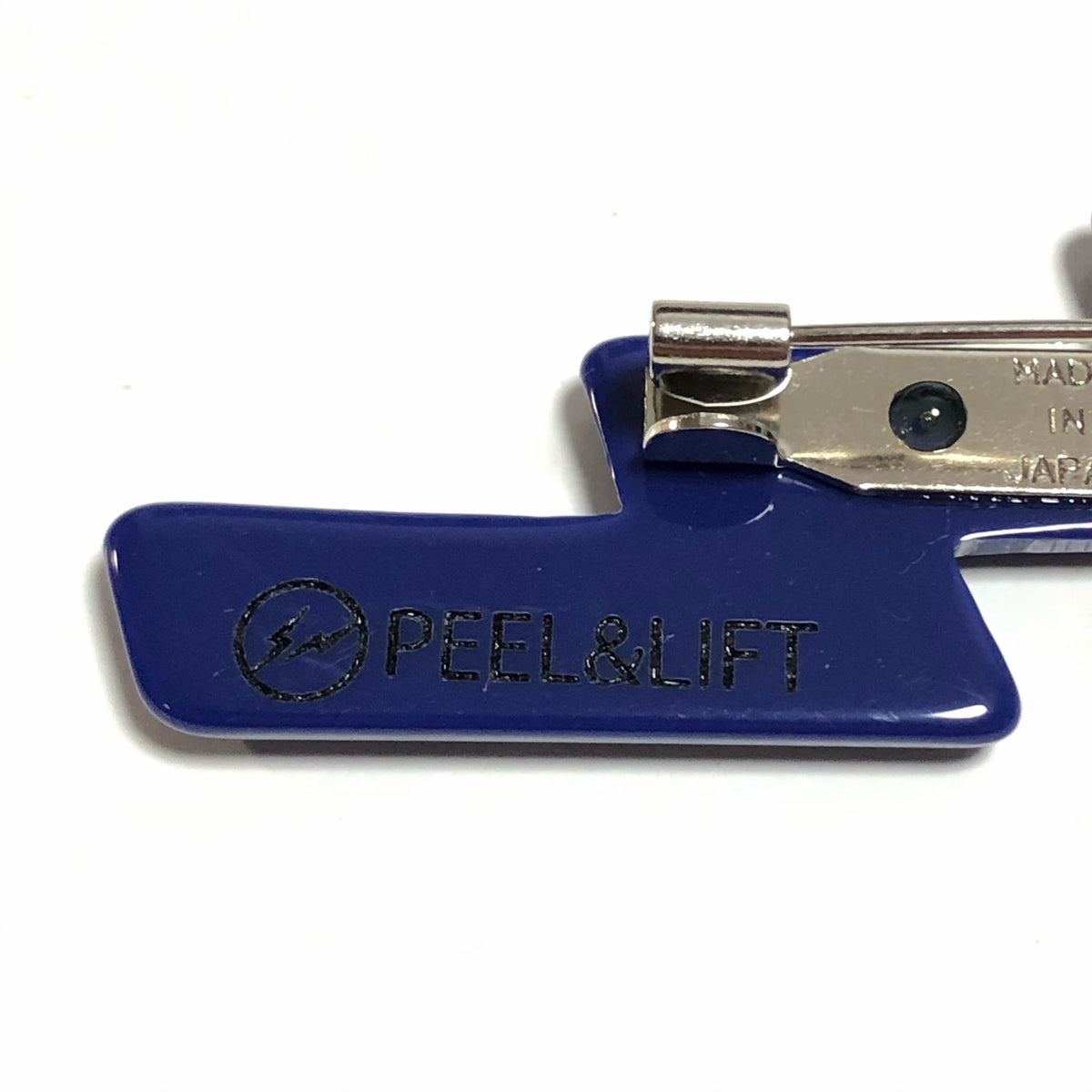 the POOL aoyama x fragment design x PEEL&LIFT LIGHTNING BADGE