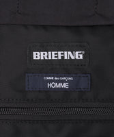 COMME des GARCONS HOMME x BRIEFING W-NAME BODY BAG [ HP-K202-051 ]