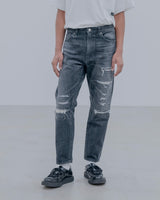 uniform experiment 25A/W DAMAGED DENIM TAPERED-FIT JEANS [ UE-252055 ]