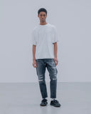 uniform experiment 25A/W DAMAGED DENIM TAPERED-FIT JEANS [ UE-252055 ]